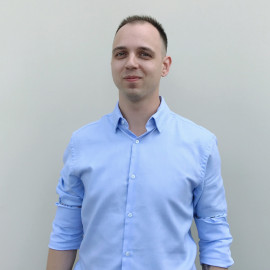 Роман Смаль